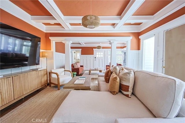 living room with coffered ceiling, beam ceiling, and light hardwood / wood-style flooring