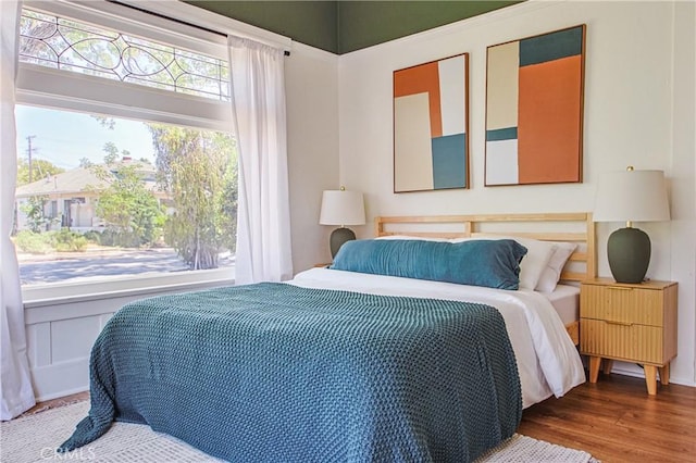 bedroom featuring hardwood / wood-style floors