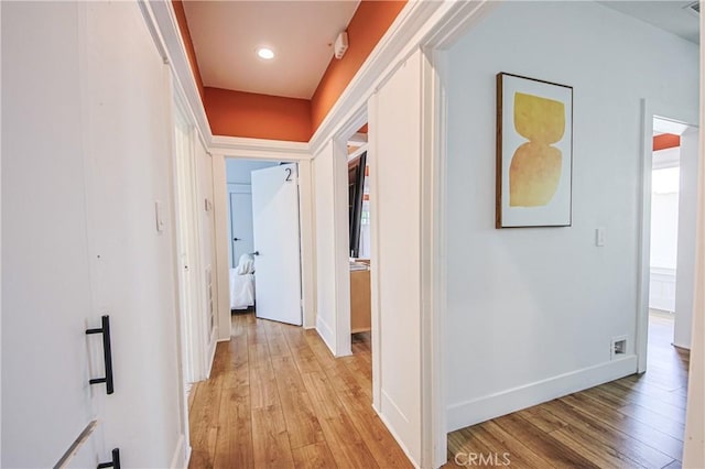 hall featuring light hardwood / wood-style flooring