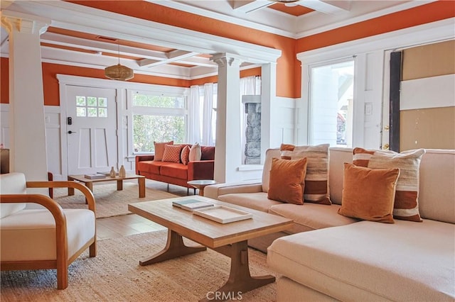 sunroom / solarium featuring coffered ceiling, beam ceiling, and ornate columns