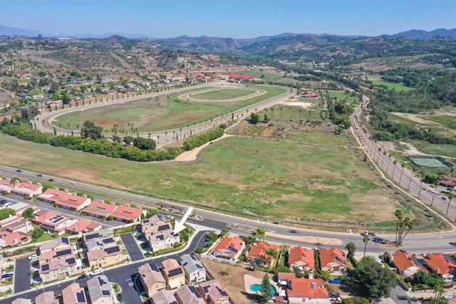 bird's eye view featuring a residential view and a mountain view