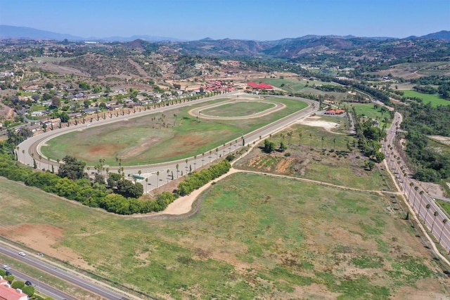 drone / aerial view featuring a mountain view