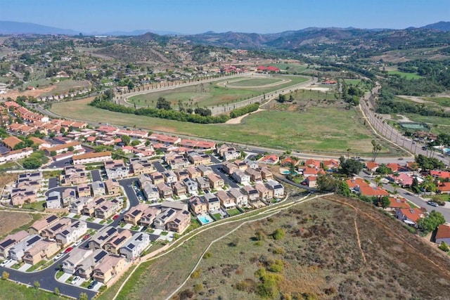 bird's eye view featuring a residential view and a mountain view