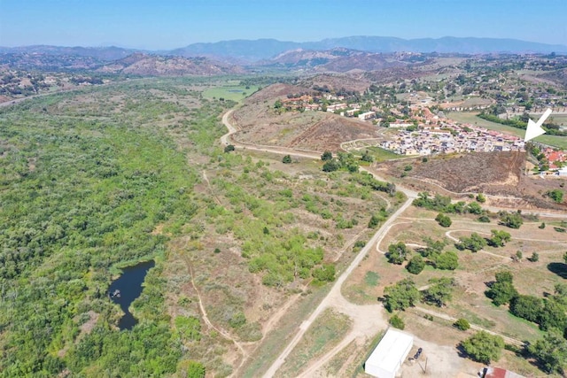 aerial view featuring a mountain view