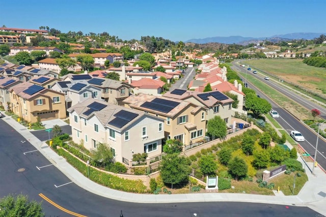 birds eye view of property featuring a residential view and a mountain view