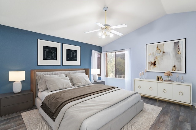 bedroom with dark wood finished floors, ceiling fan, and vaulted ceiling