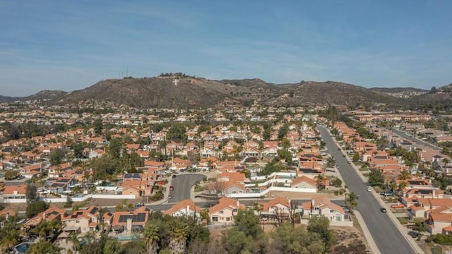 birds eye view of property with a residential view and a mountain view