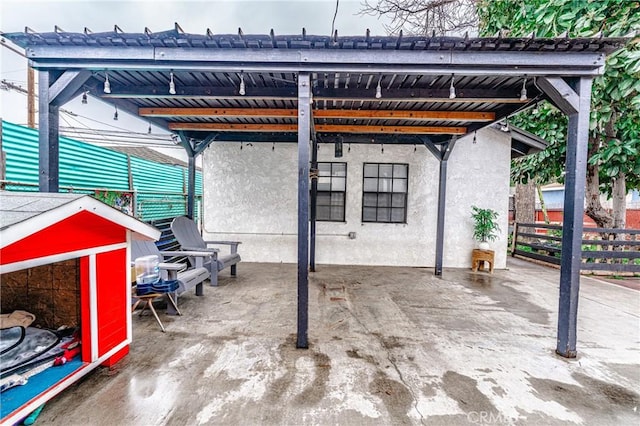 view of patio with a carport