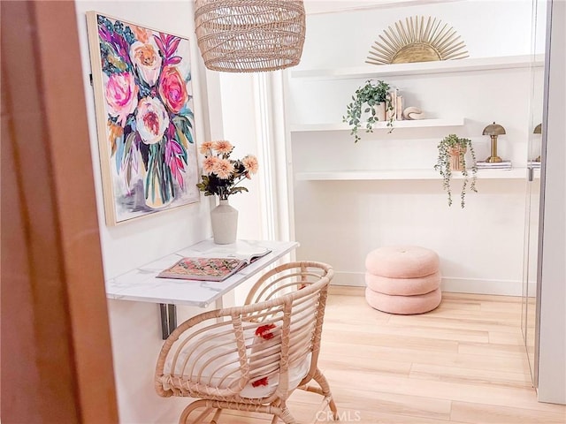 room details with baseboards and a chandelier