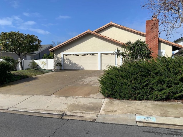 view of front of home with a garage