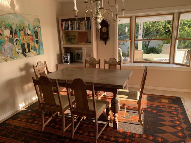 4217 Beach Bluff Rd, Carlsbad, CA 92008 - dining space with a chandelier and baseboards