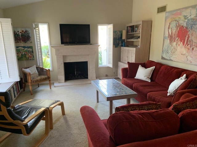 4217 Beach Bluff Rd, Carlsbad, CA 92008 - living room with carpet, lofted ceiling, and a fireplace