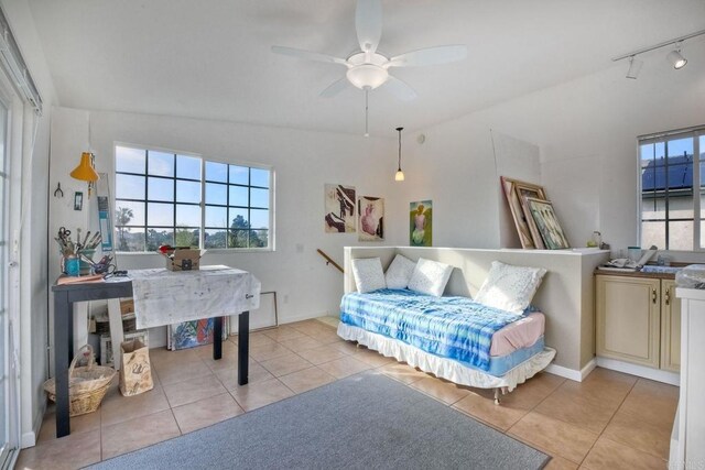 4217 Beach Bluff Rd, Carlsbad, CA 92008 - bedroom featuring light tile patterned floors, track lighting, ceiling fan, and baseboards