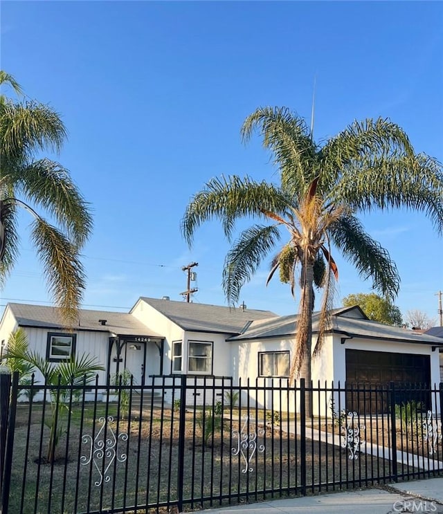 single story home with a garage