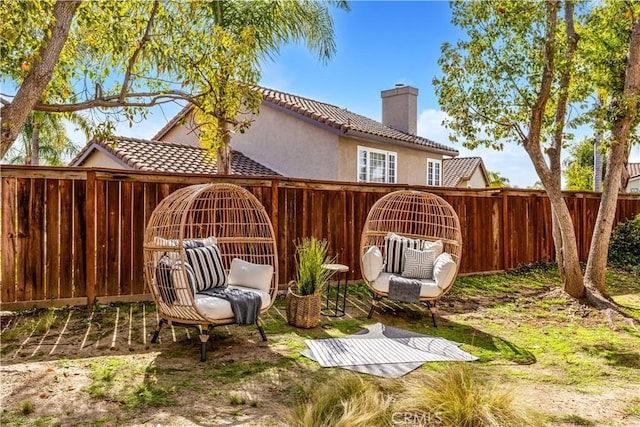 view of yard with a fenced backyard