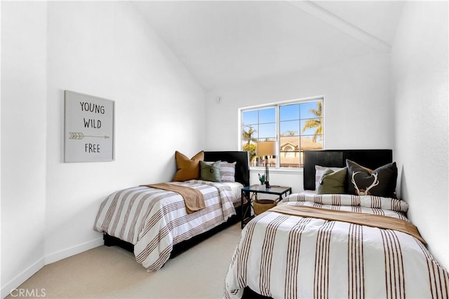 bedroom featuring high vaulted ceiling, carpet flooring, and baseboards