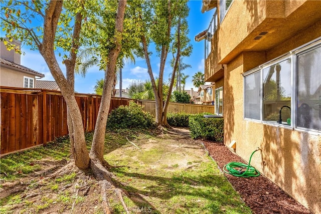 view of yard featuring a fenced backyard