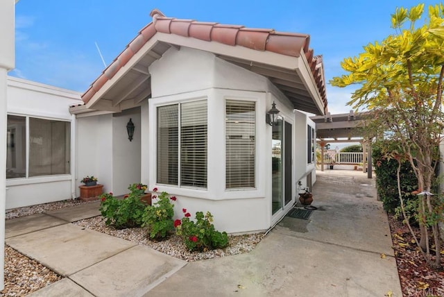 view of home's exterior with a patio area