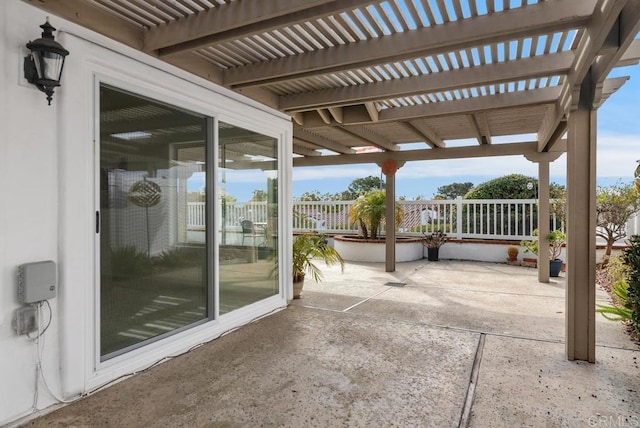 view of patio featuring a pergola