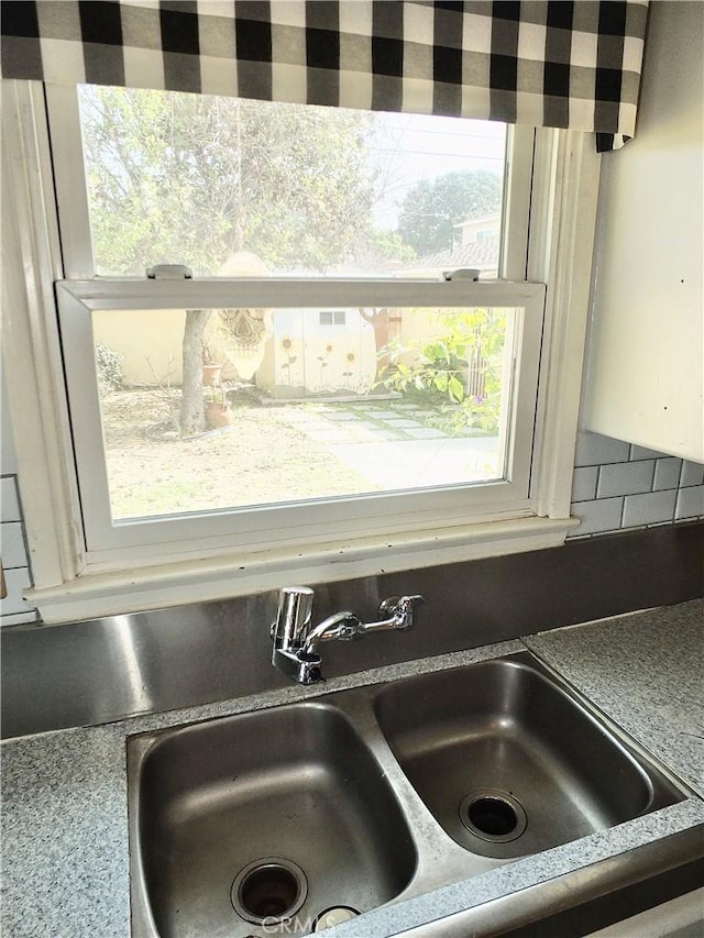 room details featuring a sink and light countertops