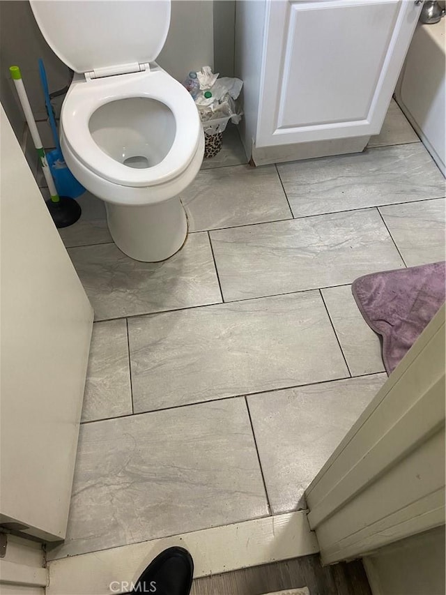 bathroom featuring toilet