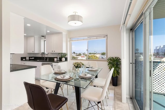 dining room featuring recessed lighting and light tile patterned flooring