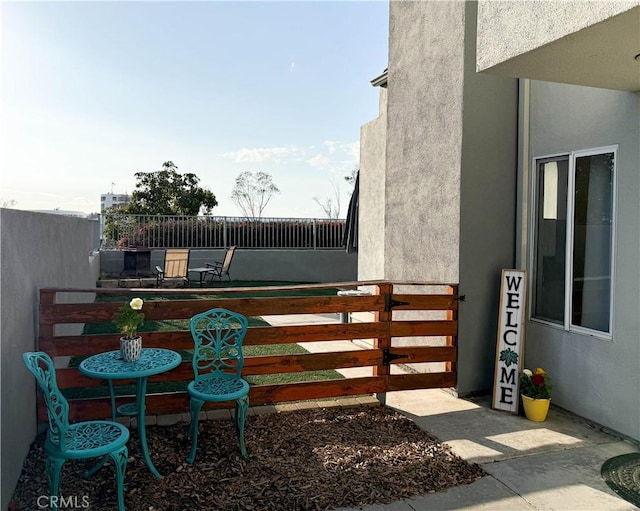 exterior space with a balcony