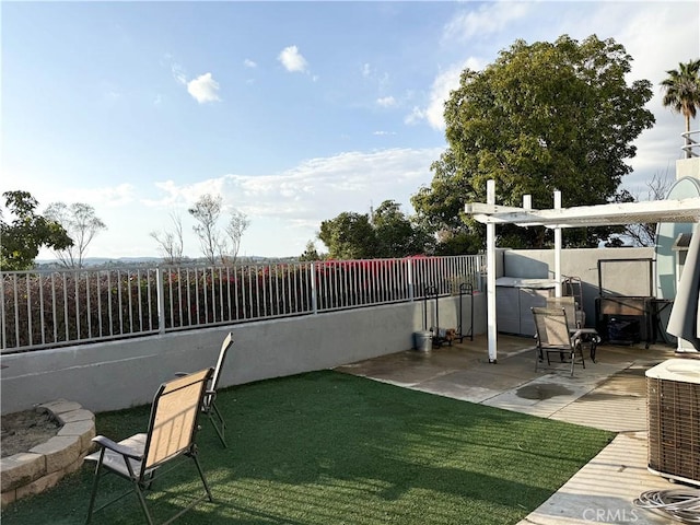 view of patio with central AC unit and fence