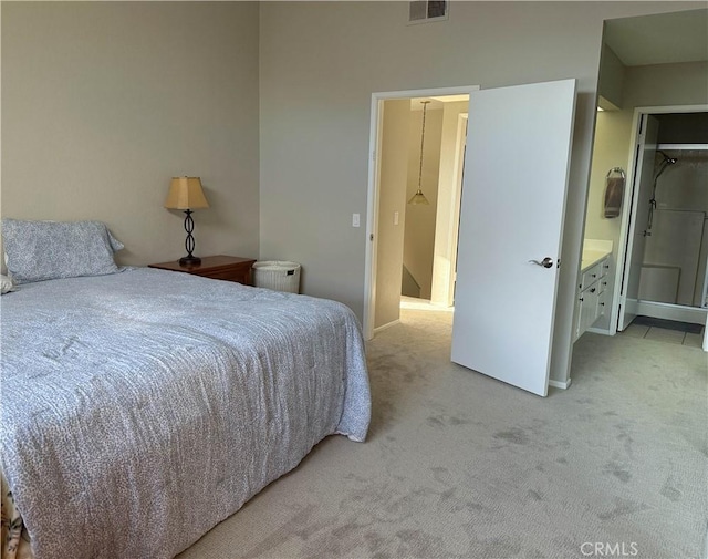 bedroom featuring carpet and visible vents