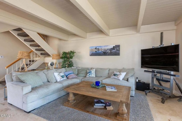 living room featuring beamed ceiling