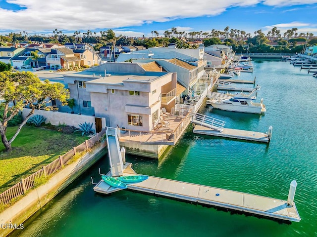 dock area with a water view