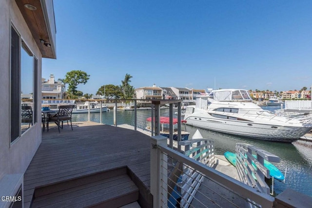 view of dock with a water view