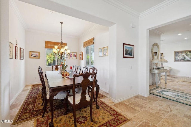 dining area featuring crown molding and a chandelier