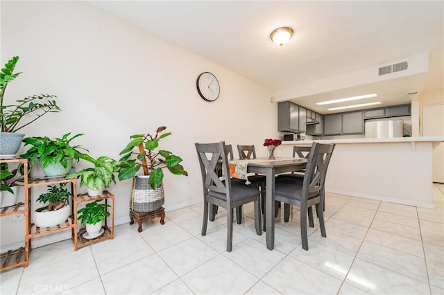 view of tiled dining area