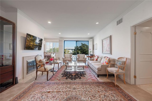 living area with light tile patterned floors, visible vents, a premium fireplace, ornamental molding, and recessed lighting