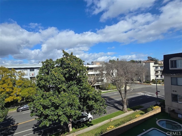 1223 Roxbury Dr Unit 305, Los Angeles, CA 90035 - view of asphalt road featuring sidewalks and curbs