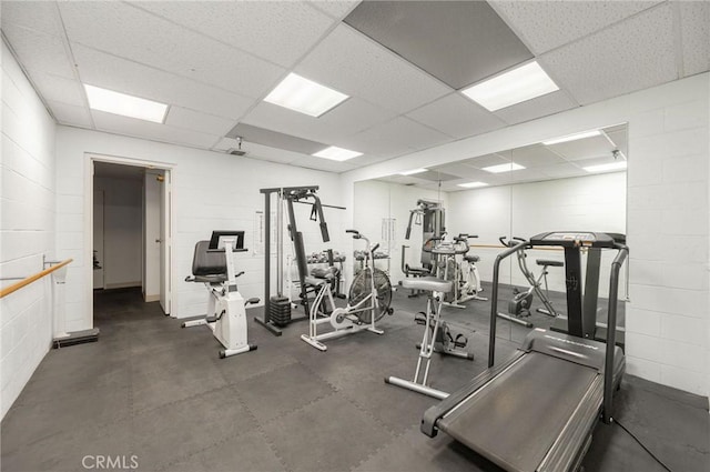 1223 Roxbury Dr Unit 305, Los Angeles, CA 90035 - workout area featuring concrete block wall and a drop ceiling