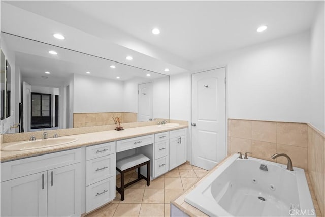 1223 Roxbury Dr Unit 305, Los Angeles, CA 90035 - bathroom featuring double vanity, recessed lighting, a tub with jets, and tile patterned flooring