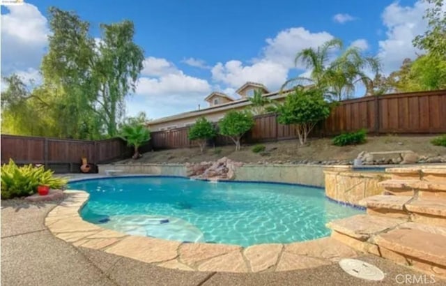 view of pool with a fenced in pool and a fenced backyard