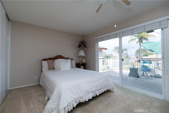 carpeted bedroom with ceiling fan and access to outside