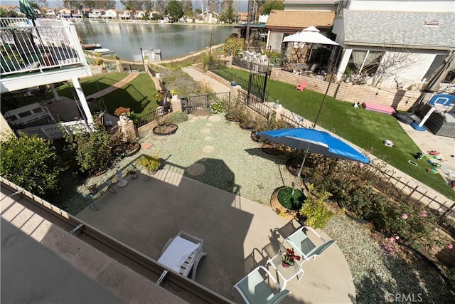 birds eye view of property featuring a water view