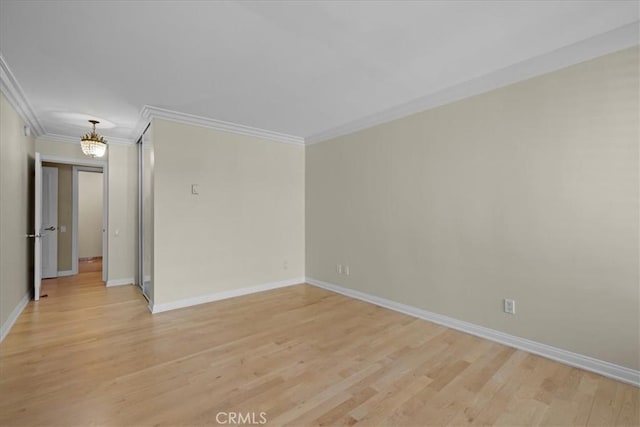 32709 Seagate Dr Unit 101, Rancho Palos Verdes, CA 90275 - unfurnished room with ornamental molding, light wood-style floors, and baseboards