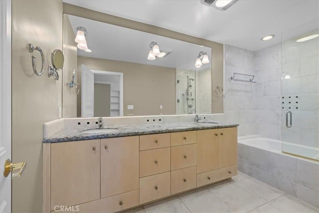 32709 Seagate Dr Unit 101, Rancho Palos Verdes, CA 90275 - full bathroom with tiled shower, a relaxing tiled tub, double vanity, and tile patterned flooring