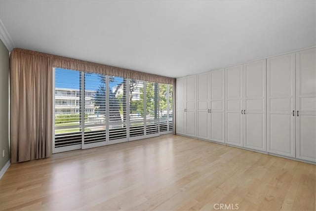 32709 Seagate Dr Unit 101, Rancho Palos Verdes, CA 90275 - unfurnished living room with light wood-style floors