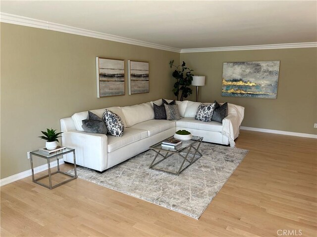 32709 Seagate Dr Unit 101, Rancho Palos Verdes, CA 90275 - living area with wood finished floors, baseboards, and ornamental molding