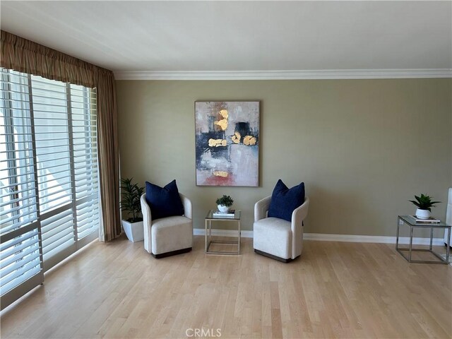32709 Seagate Dr Unit 101, Rancho Palos Verdes, CA 90275 - sitting room with wood finished floors, baseboards, and ornamental molding
