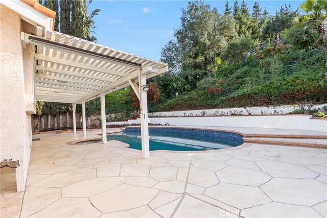 1885 Fallview Rd, Westlake Village, CA 91361 - view of swimming pool featuring a pergola, a patio, and a fenced backyard