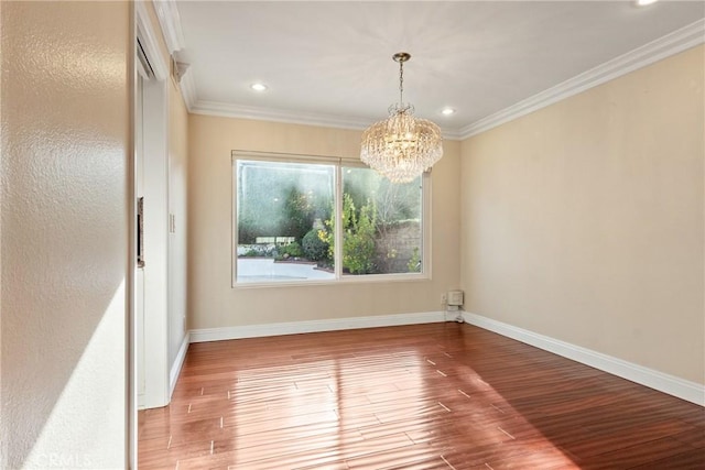 interior space with hardwood / wood-style flooring, crown molding, and a chandelier