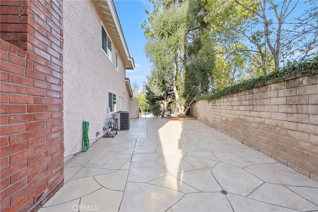 view of patio featuring central AC