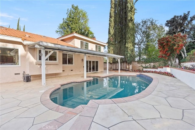 view of pool featuring a fenced in pool, a patio area, and fence